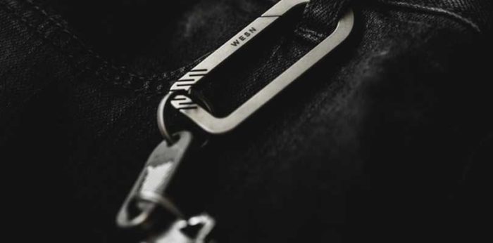 edc carabiners hanging from jeans